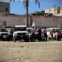 Hamas returns bodies of four more hostages as Israel limits aid to Gaza