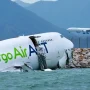 Cargo plane crashes into sea at Hong Kong airport, killing 2 on ground