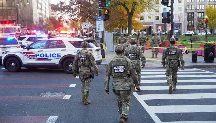 Two National Guard troops shot near White House; suspect in custody