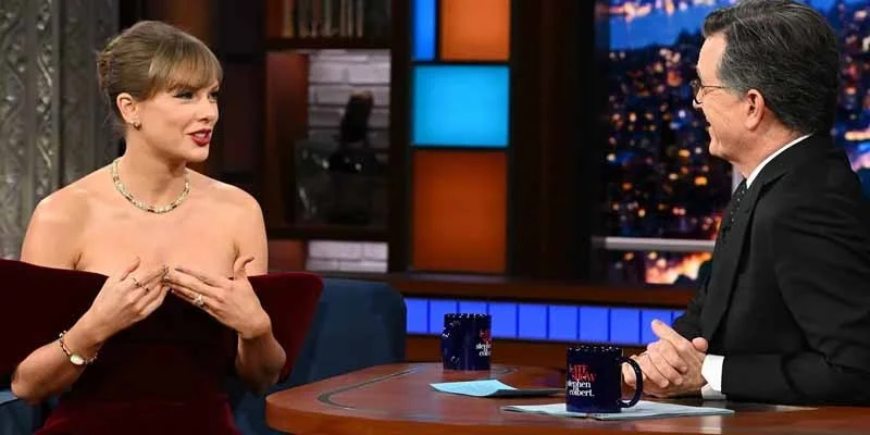 Taylor Swift stuns in $1,695 velvet minidress for "The Late Show with Stephen Colbert"