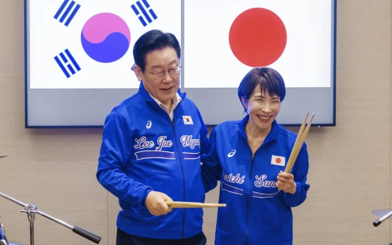 Japanese and South Korean leaders jam to K-pop hits at a summit