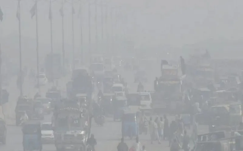 Dense fog and crisp air mark another cold day in Karachi