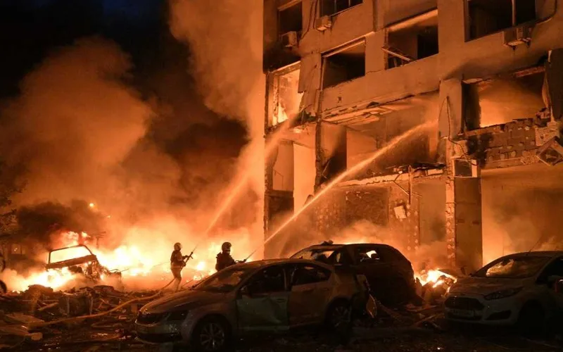 Russian missile strikes kill at least 11 in fresh attack on Kyiv